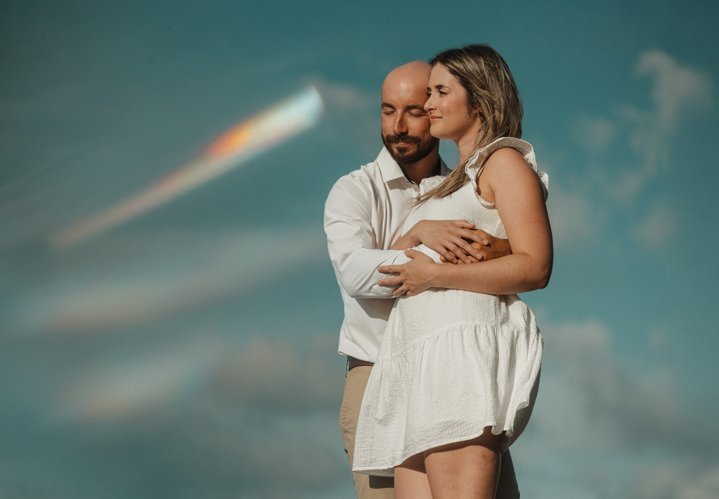 Couple embracing in warm light