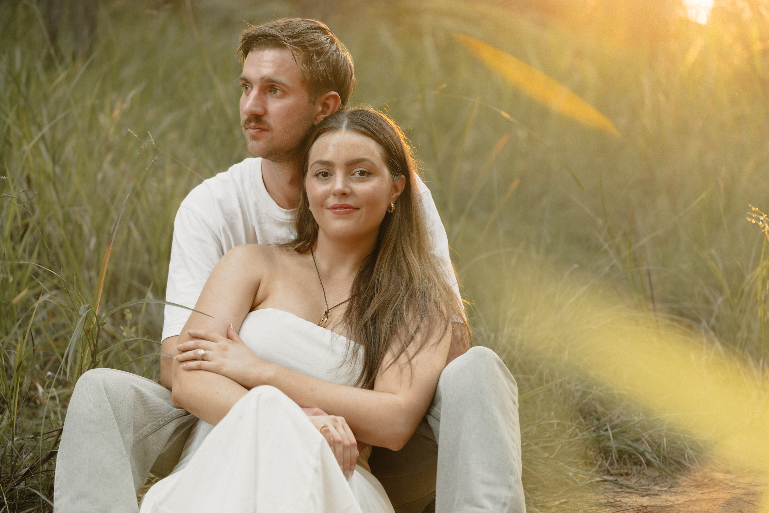 Couple sitting in golden light