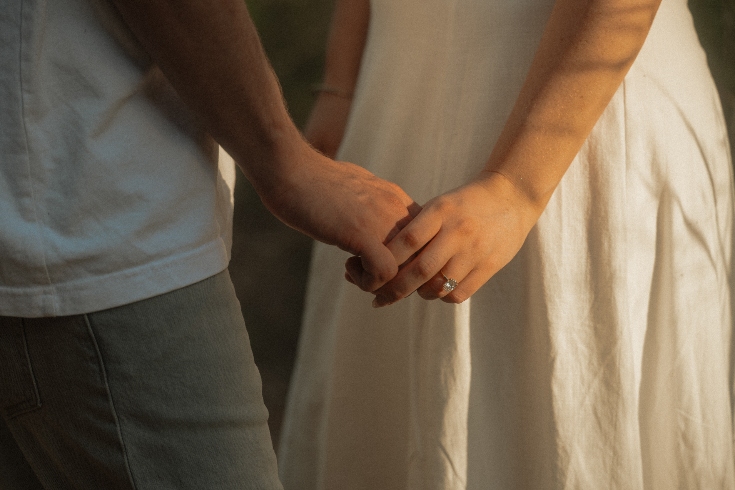 Hands in golden light, detail